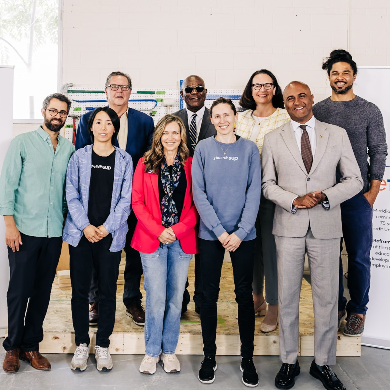 A group of attendees at the Reframe - Building Up launch event, including Meridian CEO, Jay-Ann Gilfoy. 