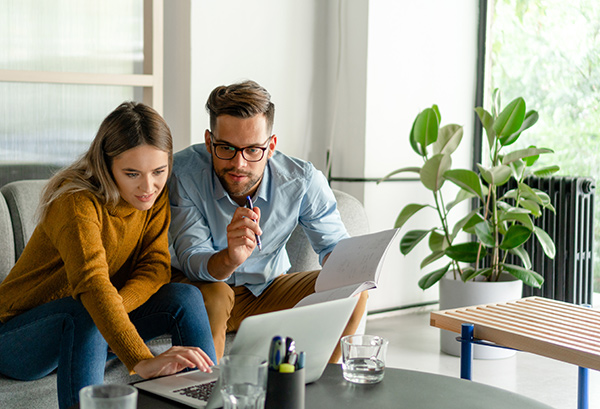 couple looking at a laptop