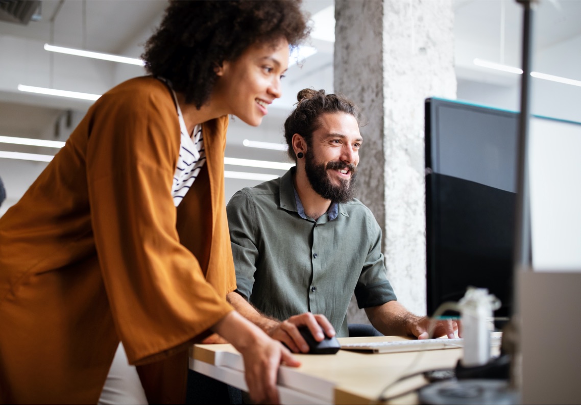 Woman and man using a computer