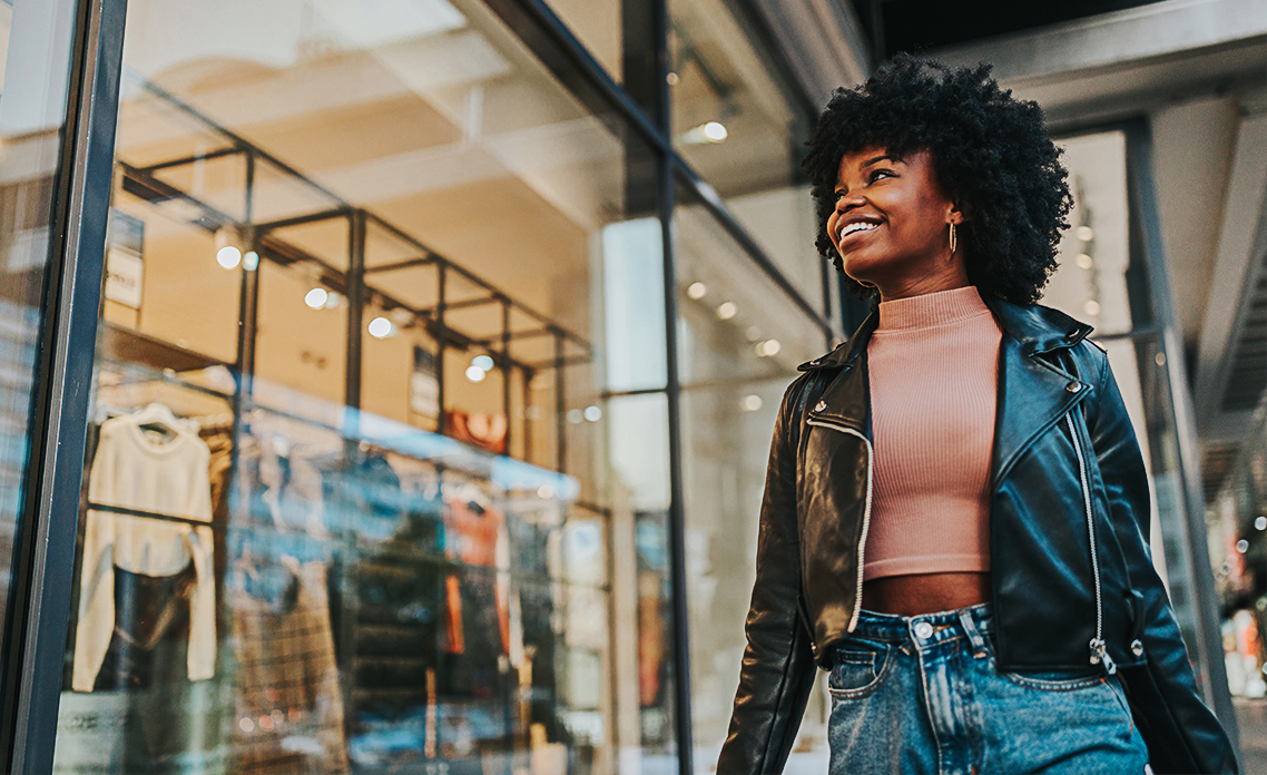 A stylish young woman out shopping