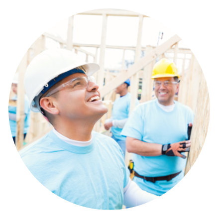 Meridian employees helping to build a house