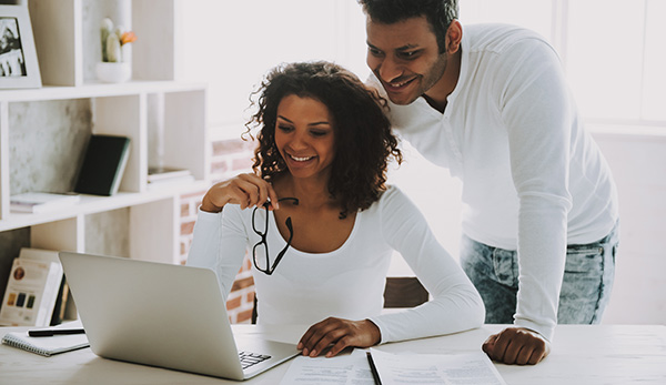 couple looking at a laptop