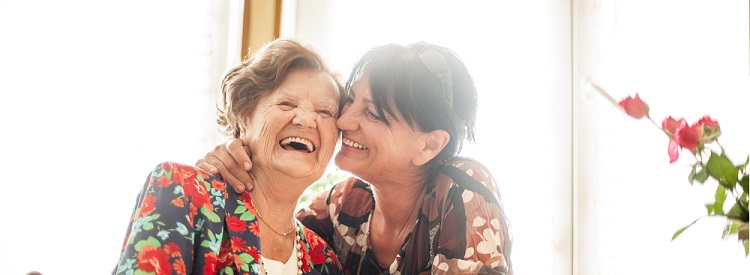 Smiling mother and daughter