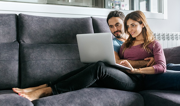 couple looking at a laptop