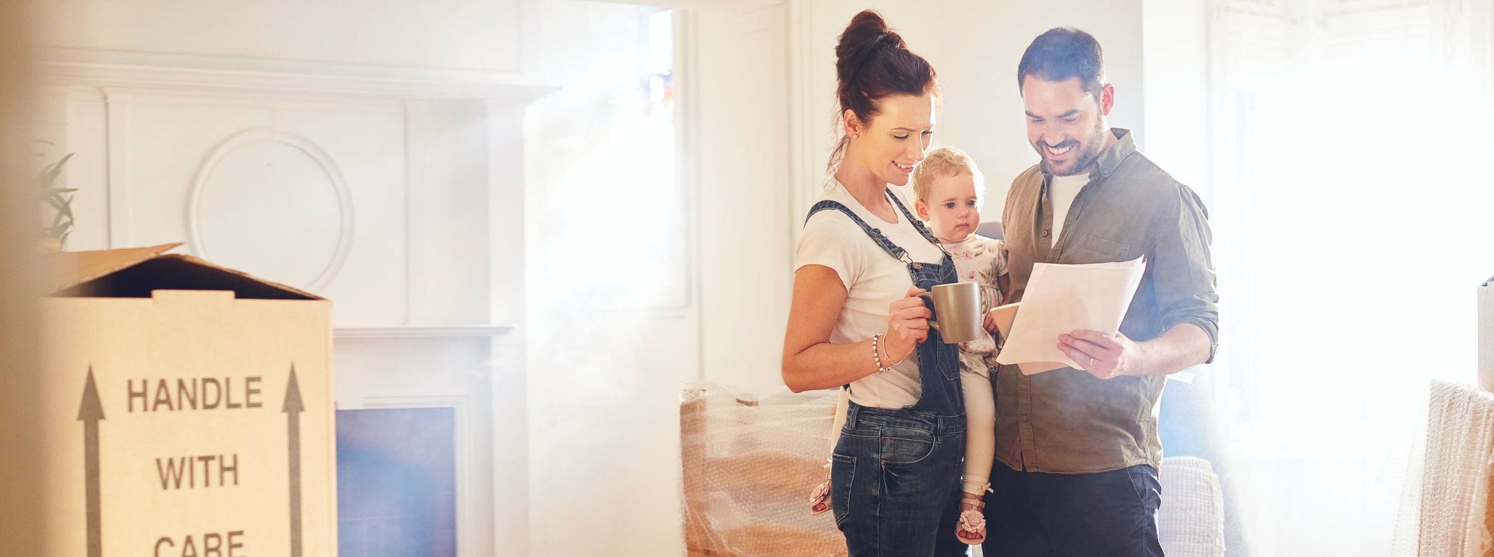 young family moving into their new home